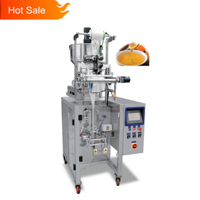 Petite taille liquide verticale volumétrique automatique de sauce à sachet d'écoulement de machine de remplissage de PLC