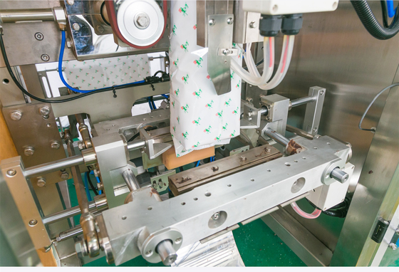 Les granules verticaux automatiques moyens de machine à emballer sème le plat de vibration d'écrous